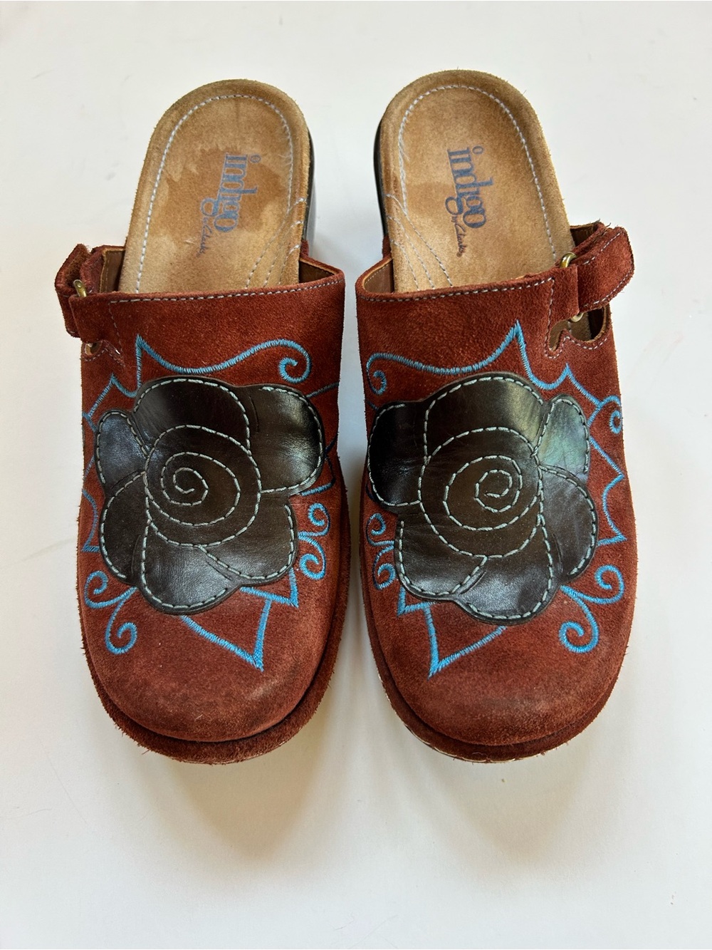 Indigo Rust Suede Clogs with Black Floral Appliqué and Blue Stitching